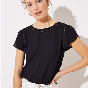 Loft cutout button back top